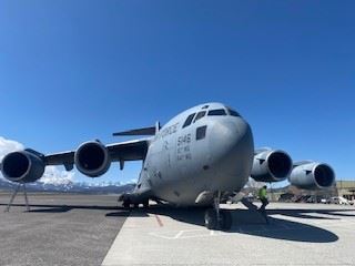 c130 plane on airport ramp 
